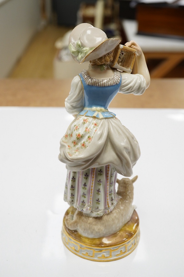 A 19th century Meissen figure of a shepherdess with a birdcage, incised F73, 18cm. Condition - fair